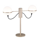 Giro 2 Light Linear Globe Glass Table Lamp with two round opal glass globes on curved black cables, champagne metal stem and round base, shown on a plain white background.