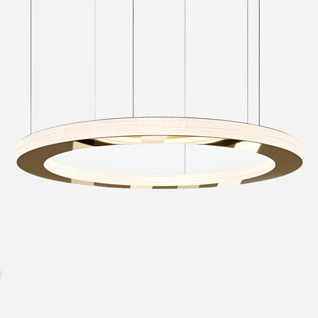 The Celine LED Single Suspension Light - Gold hangs gracefully from thin wires against a plain white background, showcasing a modern, circular design. This gold suspension light boasts a sleek, minimalist appearance with its dual-tone finish, featuring a glowing inner rim and metallic outer ring that exudes elegance and simplicity.