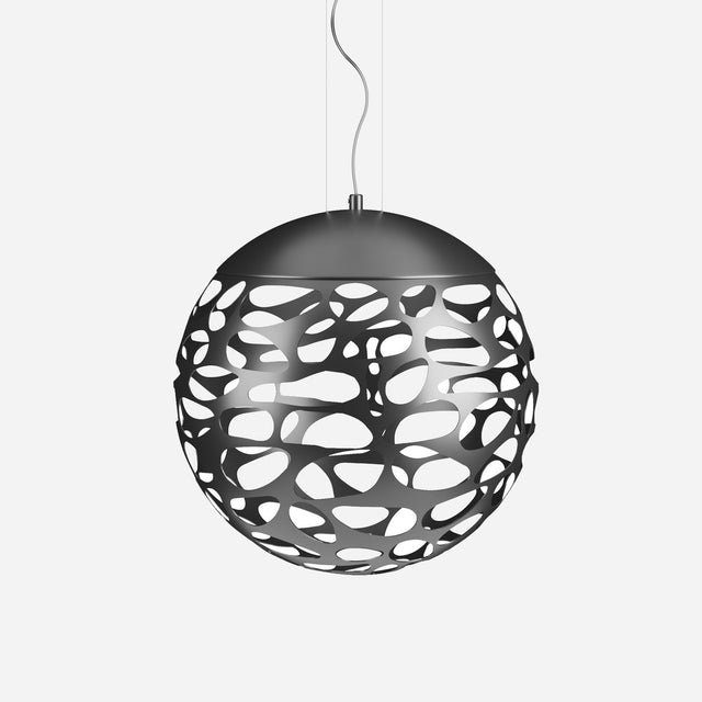 The Elon LED Light Pendant - Matte Black is a spherical contemporary lighting fixture featuring a matte black outer shell with an irregular pattern and a white interior. It hangs from a cable against a plain white background.