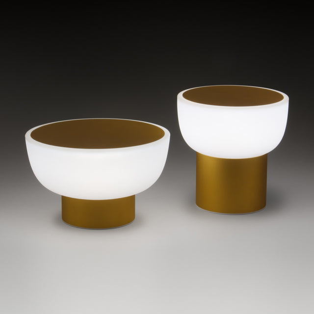 Patio LED Rechargeable Outdoor Table Lamp in gold, two sizes shown with white bowl-shaped shades on slim gold cylinder bases, set against a dark gradient background.
