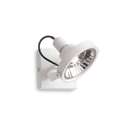 Introducing the Glim Single Spotlight in white—a contemporary, wall-mounted light fixture showcasing a sleek circular design. This spotlight boasts an adjustable head with a visible bulb and reflective interior, all mounted on a square base. It includes an adjustable diffuser connected by a black wire for versatile lighting options.