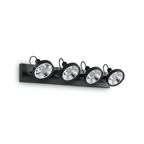 Introducing the Glim Quad Bar Spotlight in black, a contemporary wall-mounted light fixture that blends modern style with functionality. This sleek design features four adjustable round lamps complete with dimmable capabilities, making it ideal for contemporary interiors. Each lamp is equipped with an adjustable diffuser to allow for precise lighting customization.