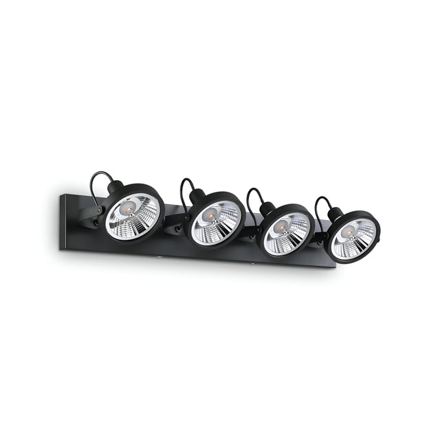Introducing the Glim Quad Bar Spotlight in black, a contemporary wall-mounted light fixture that blends modern style with functionality. This sleek design features four adjustable round lamps complete with dimmable capabilities, making it ideal for contemporary interiors. Each lamp is equipped with an adjustable diffuser to allow for precise lighting customization.