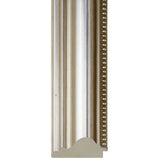 Close-up of the Verity Rectangle Wall Mirror - Silver, featuring a metallic finish and ornate frame with curved grooves and bead-like accents for a classical, elegant look.