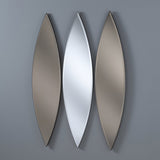 The Aurora Oval Wall Mirror Bronze & Silver – 130x30cm features an elegant elliptical design with a dual-tone finish: silver in the center and light bronze on either side, adding luxury to any gray wall.