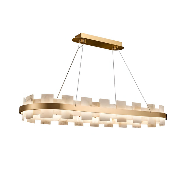 The Montyra LED Panelled Alabaster Linear Chandelier in soft white and brass features a modern rectangular design with alternating frosted glass and gold segments, suspended by four wires for elegant, diffused lighting.