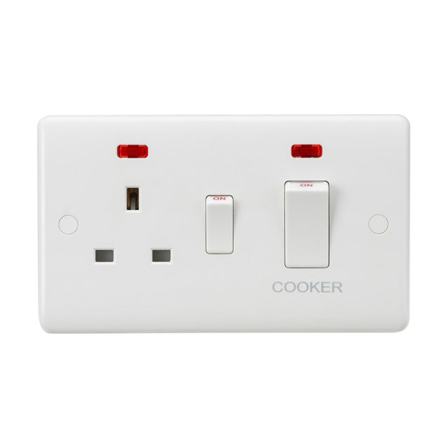 The 45A DP Switch & 13A Socket Neons - White Rocker includes a white double switch plate with a 45A DP Cooker Switch, featuring one UK electrical socket and two switches labeled COOKER. Neon indicators above each switch ensure easy visibility.