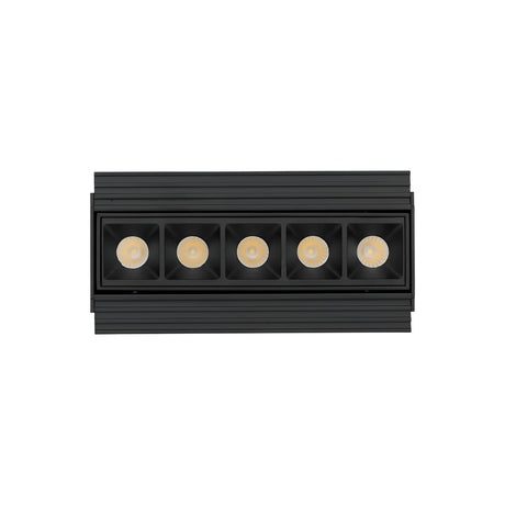 The Phosix Trimless LED Recessed Downlight offers a modern and minimalist design with its black finish and die-cast aluminum construction. This 12W fixture features a series of circular lights in a row, enhanced by a polycarbonate reflector to provide sophisticated indoor lighting at a warm 3000K.