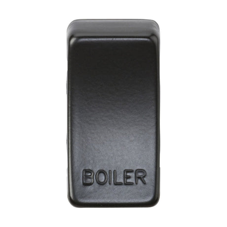 The Switch Cover "Marked BOILER" - Matt Black features a sleek rectangular design with the word "BOILER" embossed on its smooth, slightly reflective surface. Its interchangeable design fits neatly with rocker covers, and the matt black finish set against a plain white background enhances its simple sophistication.