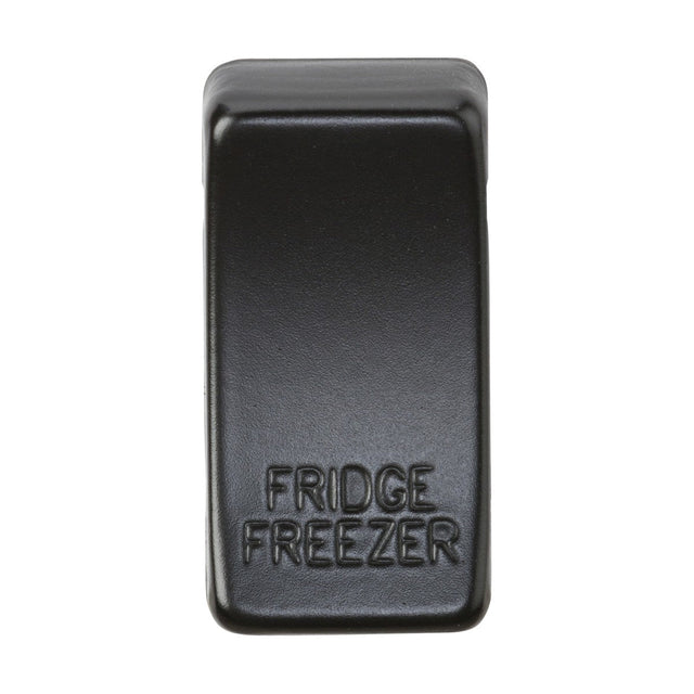 A sophisticated Switch Cover labeled "FRIDGE FREEZER" in matte black features a clean, rectangular design.