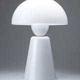 Star Table Lamp in glossy white, with a wide dome acrylic shade atop a rounded iron neck and tapering conical base, shown against a plain grey background.