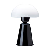 Star Table Lamp in glossy black, featuring a tapering conical iron base, small black sphere neck, and wide white acrylic dome shade, shown on a plain white background.
