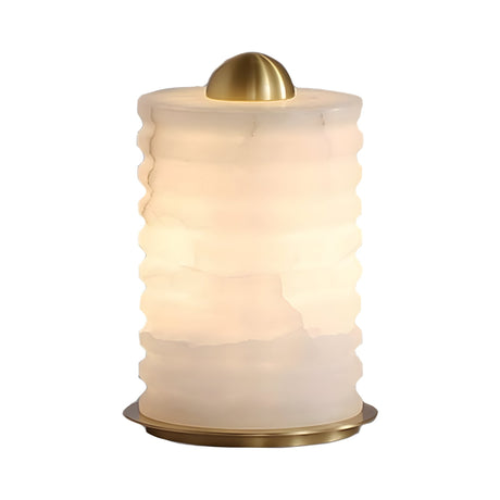 The Aurelior LED Large Ribbed Alabaster Table Lamp – Soft White features a modern design with a cylindrical, frosted white ribbed glass shade and gold accents on the top and base.