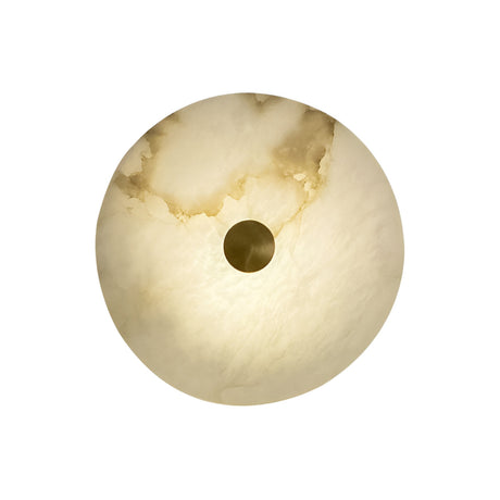 The Caldrisa LED Extra Small Circular Plate Alabaster Wall Light in soft white and brushed brass features cream Spanish alabaster with natural marbling, a central opening, and emits a warm, elegant glow reminiscent of a plate when viewed from below.