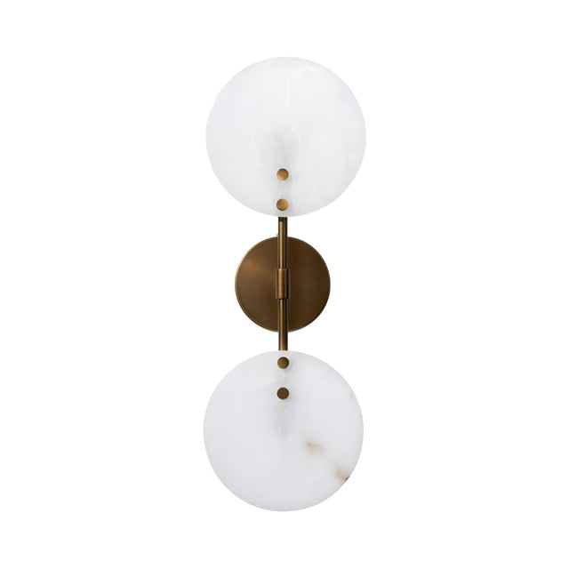 The Althia LED Alabaster Wall Light – Brushed Brass & Soft White features two stacked round alabaster shades on a vertical brushed brass rod with a circular mount, offering an elegant touch to any decorative lighting scheme.