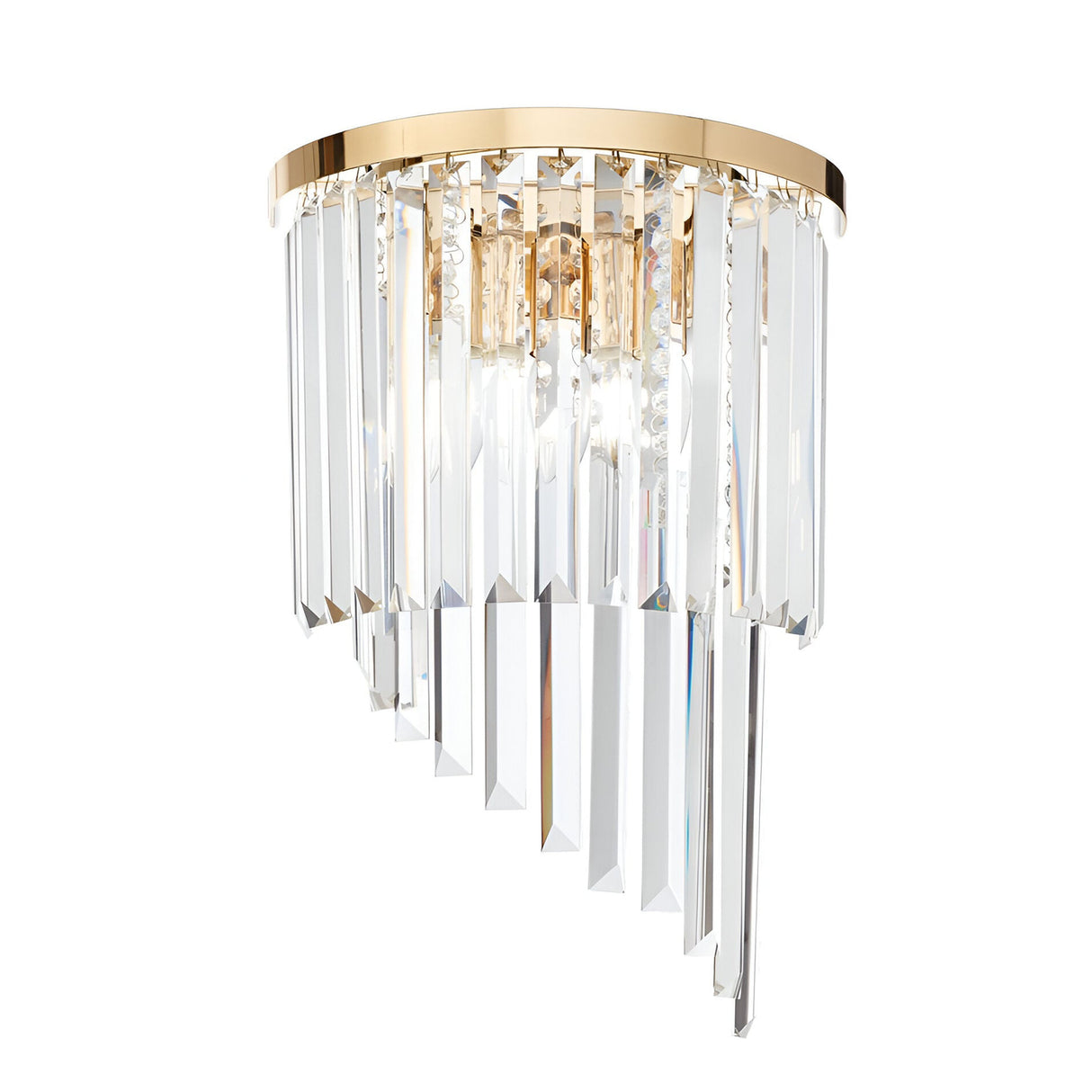 The Emberara 3 Light Crystal Wall Light in Gold is a luxurious and modern lighting fixture, featuring shimmering accents and cascading crystal prisms.