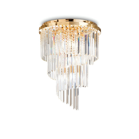 The Emberara 24 Light Crystal Chandelier in Gold features a luxurious design with cascading tiers of prisms, making it a sophisticated and elegant piece of luxury lighting.