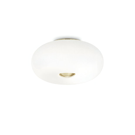 The Solitha 5 Light Flush - White features a modern ceiling light fixture with a white glass diffuser, ribbed dome design, and satin brass accent at the base, all set against a plain white background.