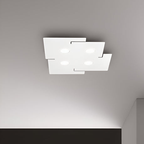 The Emberix 4 Light Ceiling Light in white is a modern ceiling fixture with a minimalist square design, featuring four symmetrically arranged recessed circular lights. This eco-friendly lighting option includes energy-efficient bulbs and offers a sleek matte finish.