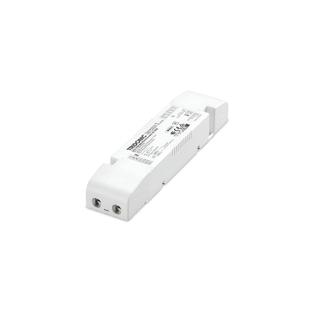 The Radiara Constant Current Dimmable LED Driver - 10W, 300mA is a rectangular white device with connection points on both ends. It boasts constant current functionality and is marked with various printed details, including the Tridonic brand name and important safety certifications.