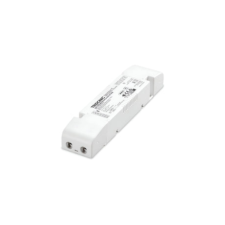 A Radiara Constant Current Dimmable LED Driver (17W, 450mA) is a white rectangular electronic device with printed text and symbols on its surface. It includes electrical connectors at one end for easy integration into lighting systems that require constant current.