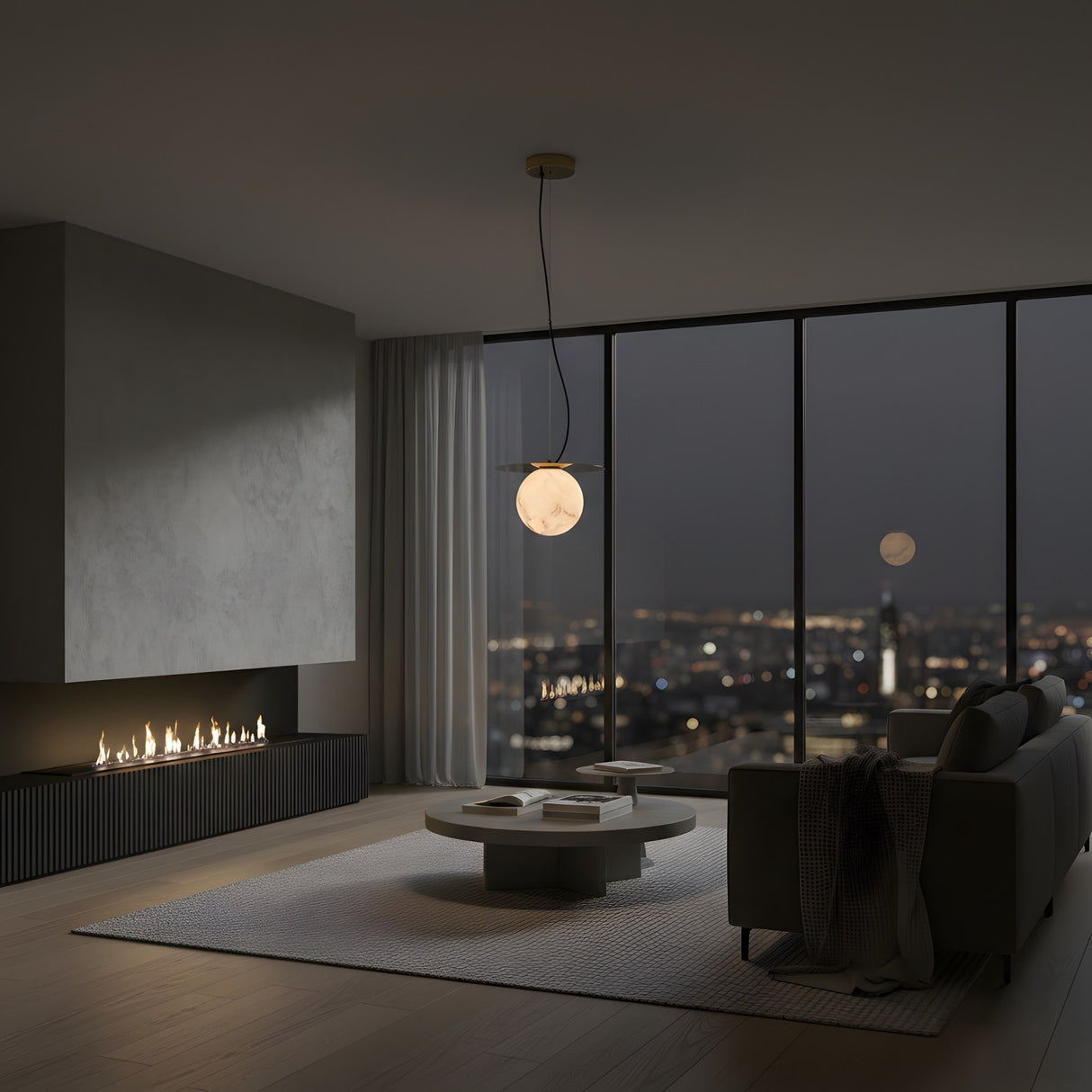 A modern living room at night features minimalist furniture, a round coffee table, and floor-to-ceiling windows with city views, softly lit by the Marenzo 1 Light Small Orb Alabaster Single Pendant Light in Soft White & Brushed Brass beneath the full moon.