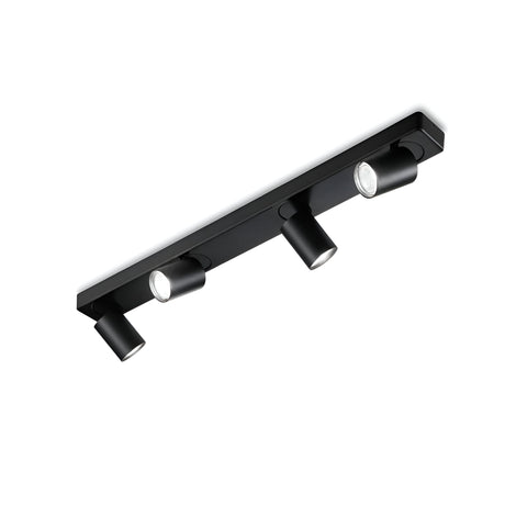 Introducing the Sparkeon Quad Bar Round Spotlight in Black, featuring three adjustable cylindrical spotlights elegantly mounted on a rectangular track. This modern and minimalistic ceiling light fixture offers functionality with its sleek black finish and adjustable diffusers for precise interior lighting.