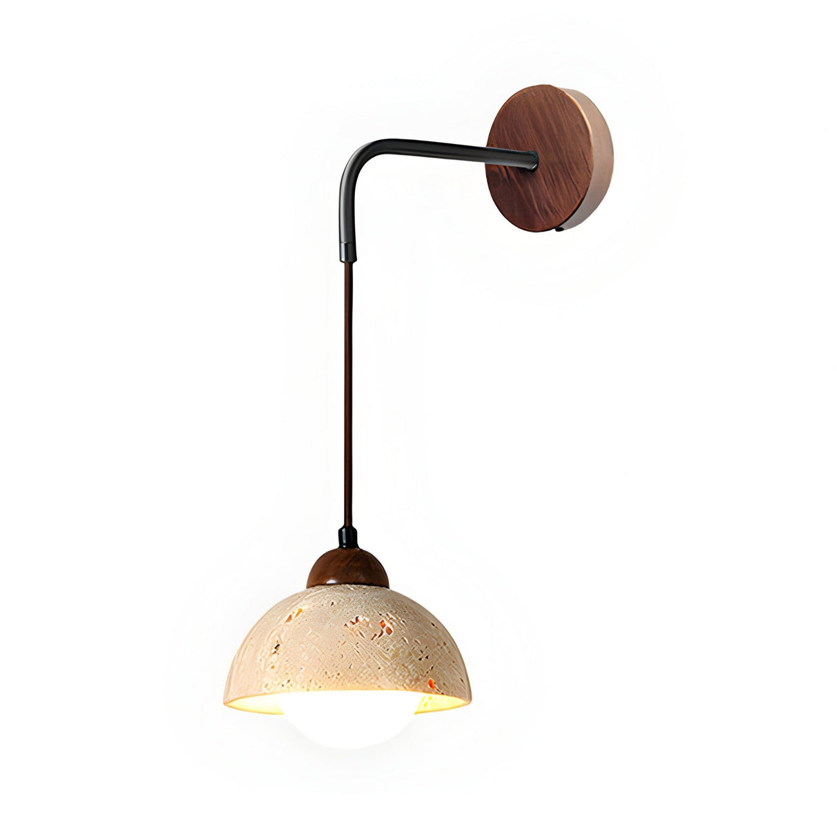 The Marvoro 1 Light Hanging Bowl Travertine Wall Light features a walnut brown wall sconce, black metal arm, and a dome-shaped light beige shade with small holes, creating a modern accent against a white background.