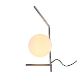 The Vetra 1 Light Opal Glass Table Lamp in Grey features an opal glass sphere on a sleek, angled chrome frame with a visible black power cord—ideal for enhancing modern interiors.