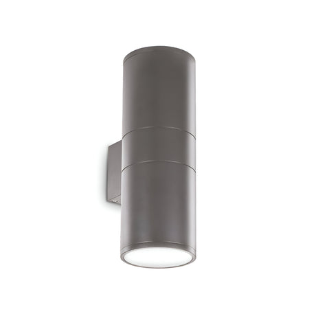 Introducing the Solar 2 Light Outdoor Large Wall Light in anthracite, featuring a sleek, modern cylindrical design. This light offers dual light emission with two strategic light sources, one at the top and one at the bottom, creating a striking up-and-down lighting effect.