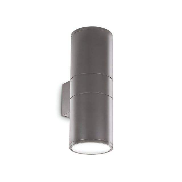 Introducing the Solar 2 Light Outdoor Large Wall Light in anthracite, featuring a sleek, modern cylindrical design. This light offers dual light emission with two strategic light sources, one at the top and one at the bottom, creating a striking up-and-down lighting effect.