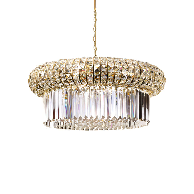 The Enluma Crystal 16 Light Chandelier - Gold is a luxurious lighting masterpiece, featuring a round, layered design with a gold-toned metal frame embellished with sparkling clear and amber crystals. This chandelier hangs beautifully from a chain and includes dimmable functionality to gracefully reflect light.