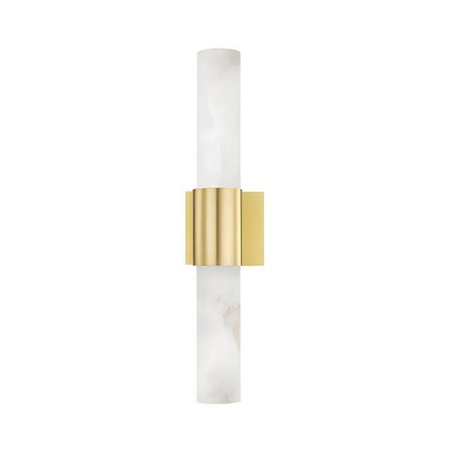 The Fiora LED Alabaster Wall Light features two cylindrical soft white glass tubes joined by a wide brushed brass band, creating a sleek and modern look.