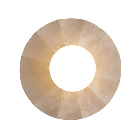 The Caldera 1 Light Small Disc Travertine Wall Light in light beige features a smooth, circular travertine design with a wide inner opening, resembling a minimalist donut, shown against a white background.