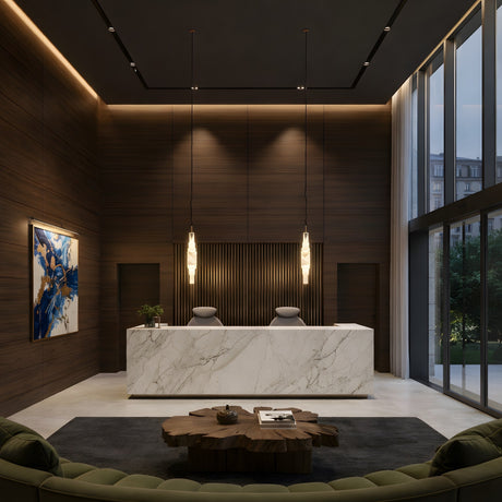 Modern lobby with a marble reception desk, two chairs, Aurelia LED Alabaster Pendant Light – Soft White, wood-paneled walls, large windows, abstract art, a round wooden coffee table, and a green curved sofa on a dark rug.