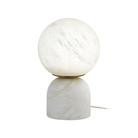 The Solvyn LED Small Globe Alabaster Table Lamp – Soft White features a round, frosted glass globe on a smooth cylindrical alabaster base with subtle veining and includes a power cord at the back.
