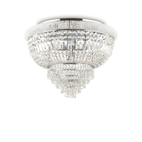 Introducing the Emberlit 24 Light Crystal Chandelier - Chrome, featuring multiple tiers of dazzling prisms cascading from a sleek chrome circular base. This luxurious and elegant fixture is designed to create a glamorous lighting effect, while its dimmable feature allows for customizable ambiance in any space.