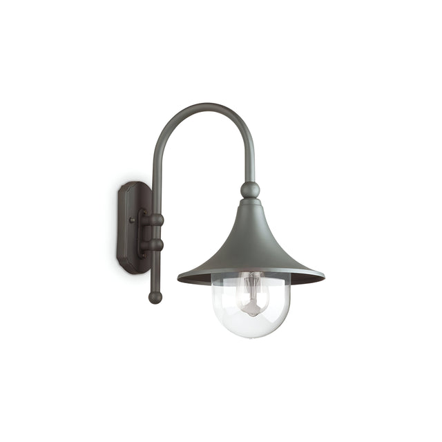 The Lumis Outdoor Wall Light - Grey showcases a black outdoor design with a curved arm and bell-shaped shade, both made from die-cast aluminum in a sleek grey finish. It encases a clear globe that reveals an exposed light bulb.