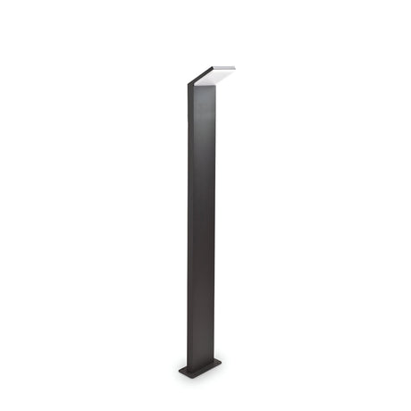The Brillix Outdoor LED Bollard Light in Anthracite is an elegant and minimalist lighting solution, featuring a tall, rectangular design with a creatively angled light source at the top. This 100cm fixture offers energy-efficient illumination at 3000K, making it perfect for enhancing any modern outdoor space.