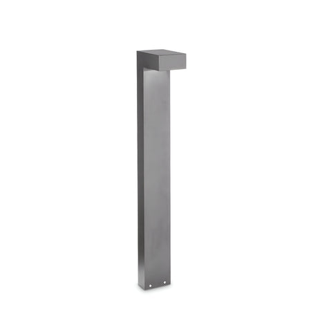 The Luma Outdoor Bollard Light - Grey, 80cm is a sleek and modern lighting option with a tall rectangular metal body and flat top. It offers a durable lighting solution with a minimalist design, finished in dark grey, making it ideal for illuminating pathways or gardens.