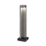 Introducing the Starry Outdoor LED Bollard Light—a contemporary outdoor lighting solution. This 74cm fixture features a sleek, rectangular grey design with a black base and offers an IP55-rated protection. Emitting a soft, energy-efficient glow from its top with its 9W power at 3000K, it provides stylish illumination for any outdoor setting.