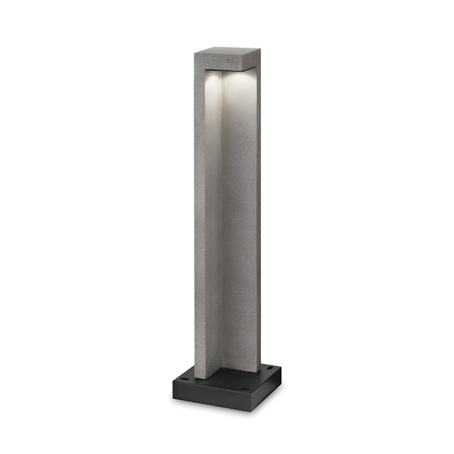Introducing the Starry Outdoor LED Bollard Light—a contemporary outdoor lighting solution. This 74cm fixture features a sleek, rectangular grey design with a black base and offers an IP55-rated protection. Emitting a soft, energy-efficient glow from its top with its 9W power at 3000K, it provides stylish illumination for any outdoor setting.