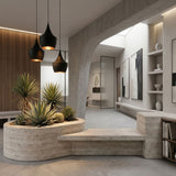 A modern, minimalist interior features a built-in stone planter filled with succulents and cacti, abstract wall art, neutral-toned clean-lined furnishings, and the Funk Fat Pendant Light - Black hanging above.