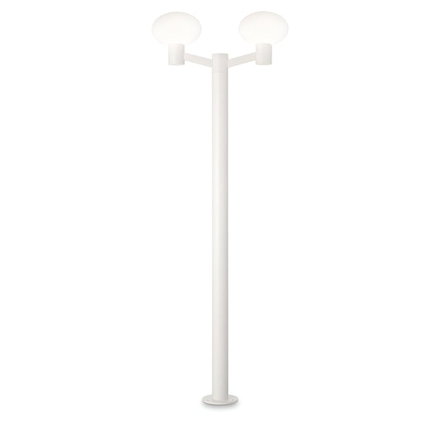 The Photonix Twin Head Lamp Post - White features a sleek, minimalist design with two frosted, round bulbs mounted on a sturdy aluminum frame. Ideal for outdoor illumination, it rests gracefully on a circular base against a simple white backdrop.