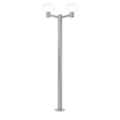 The Photonix Twin Head Lamp Post in grey features a tall and sleek design with a modern aesthetic, complemented by two spherical white bulbs at the top, set against a plain white background.