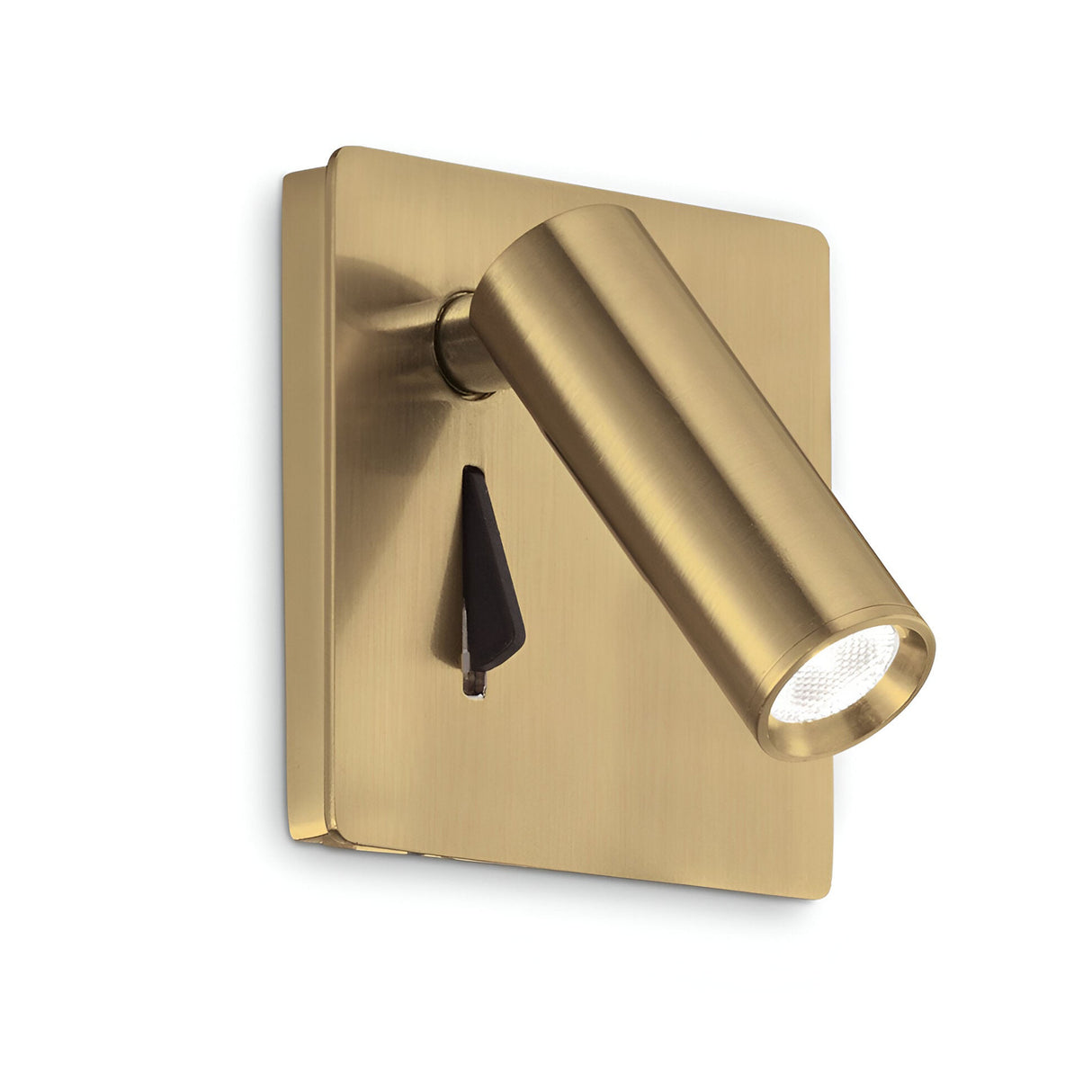 The Ambience LED Wall Spotlight - Brass is a sophisticated wall-mounted reading light featuring a brass finish, a rectangular base with a sleek black triangular switch, and an adjustable cylindrical lamp head with an elegant diffuser.