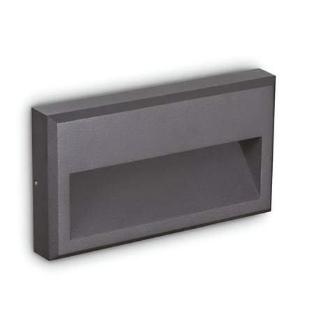 Introducing the Arcana-1 LED Outdoor Wall Light 6W 3000K - Grey, a modern and sleek rectangular fixture designed for wall mounting. This energy-efficient light boasts a minimalist aesthetic with its recessed light area and grey finish, perfect for enhancing any outdoor space.