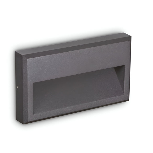 Introducing the Arcana-1 LED Outdoor Wall Light 6W 3000K - Grey, a modern and sleek rectangular fixture designed for wall mounting. This energy-efficient light boasts a minimalist aesthetic with its recessed light area and grey finish, perfect for enhancing any outdoor space.