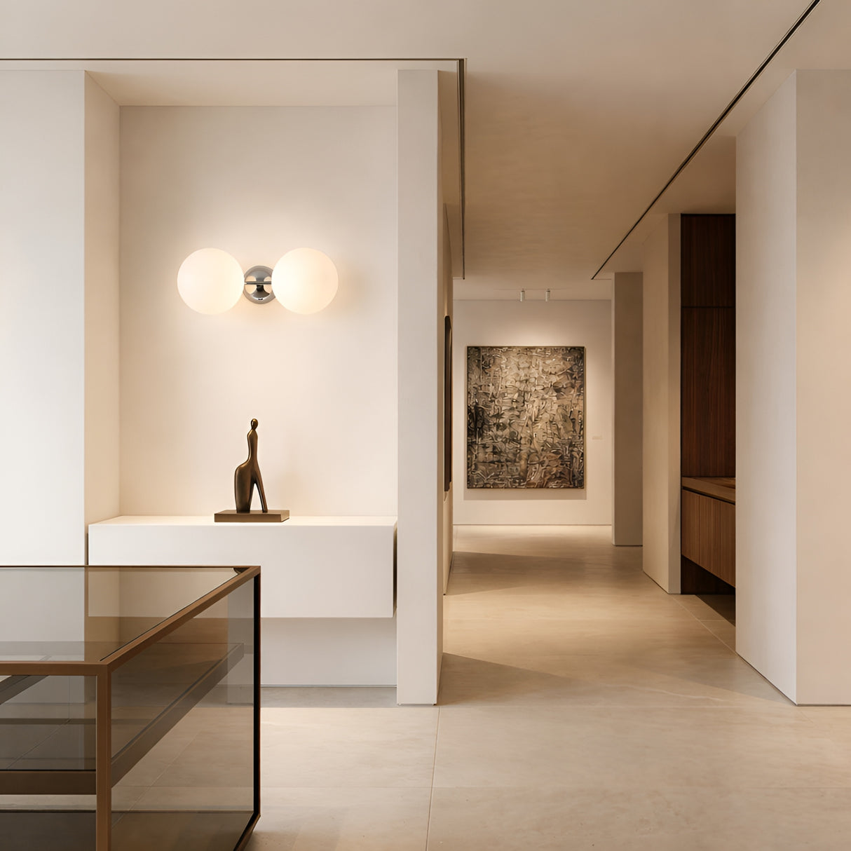 Modern minimalist hallway with neutral walls and floors, the Vetra 2 Light Opal Glass Wall/Semi-Flush Ceiling Light in grey, a sculptural figurine on a console, and a large abstract painting at the end of the hall.