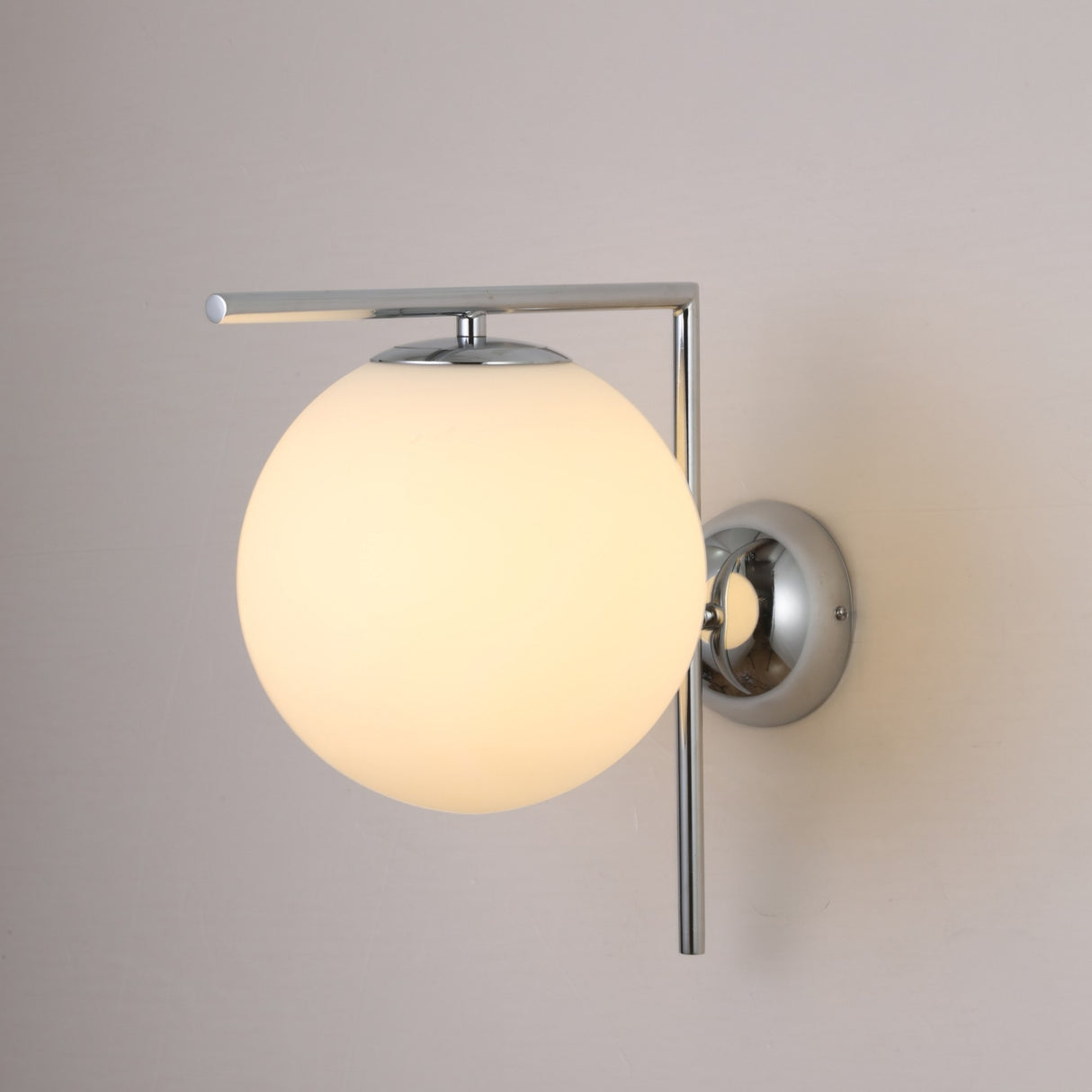 The Vetra 1 Light Opal Glass Wall/Semi-Flush Ceiling Light in Grey features a sleek, Nordic-inspired design with a round frosted shade, offering a soft warm glow—ideal for adding understated elegance to any room.